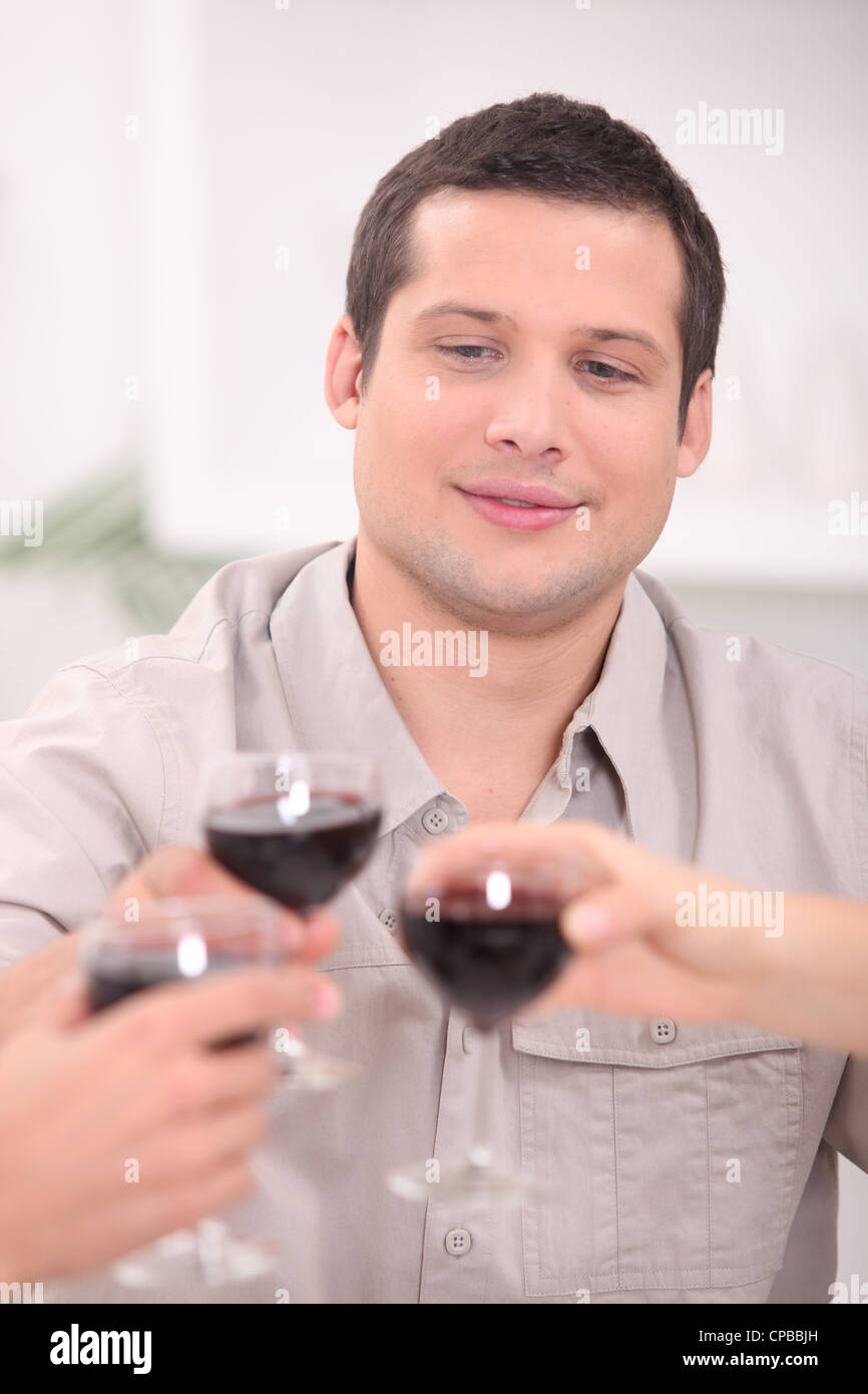 Man toasting with wine Stock Photo Alamy