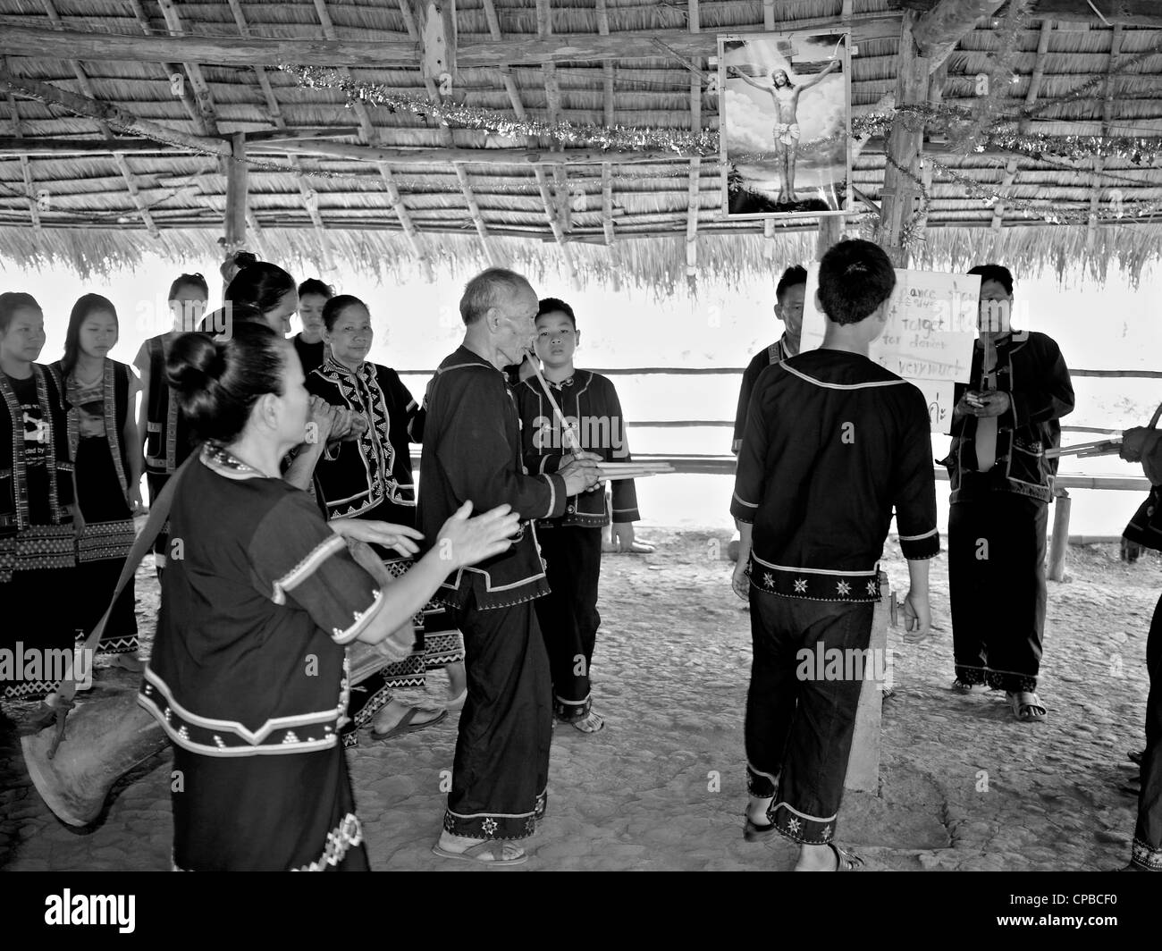Lahu people of Thailand's Northern hilltribes. Christian in their believe and seen here worshiping Christ. Chiang Rai province. Rural Thai hill tribes Stock Photo