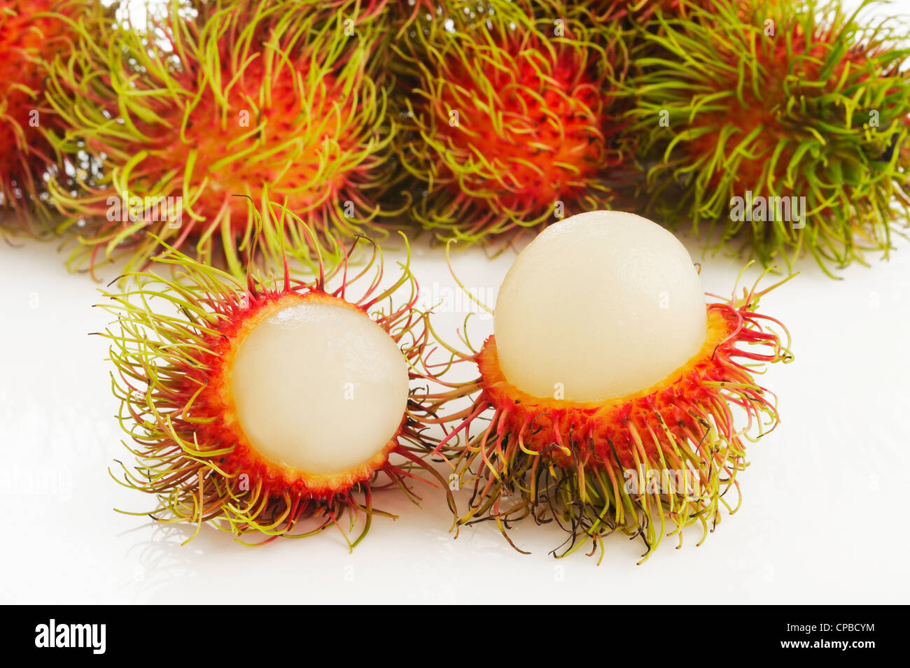 Rambutan fruits on white background Stock Photo - Alamy