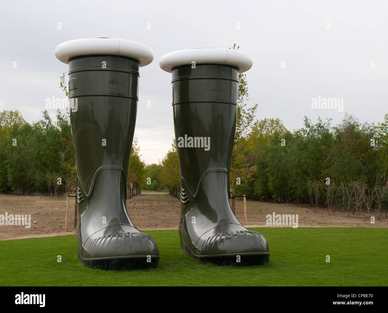 two green big boots at the floriade show 2012 in Holland Stock Photo - Alamy