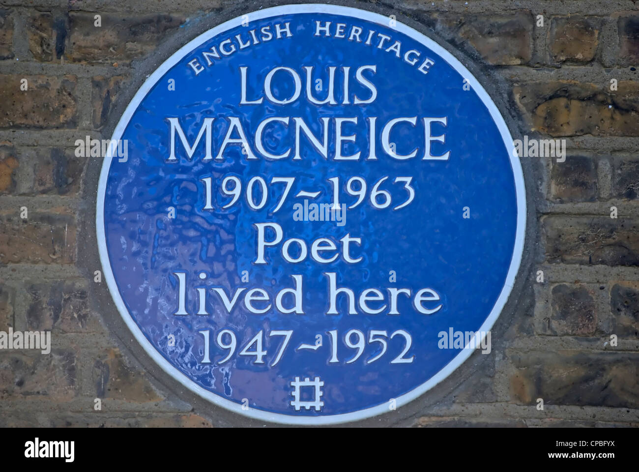 english heritage blue plaque marking a home of poet louis macneice, islington, london, england Stock Photo
