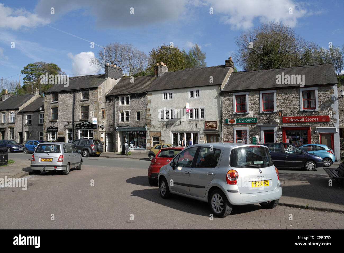 Tideswell village in the Peak district in Derbyshire, England UK, English rural village Parked cars Stock Photo