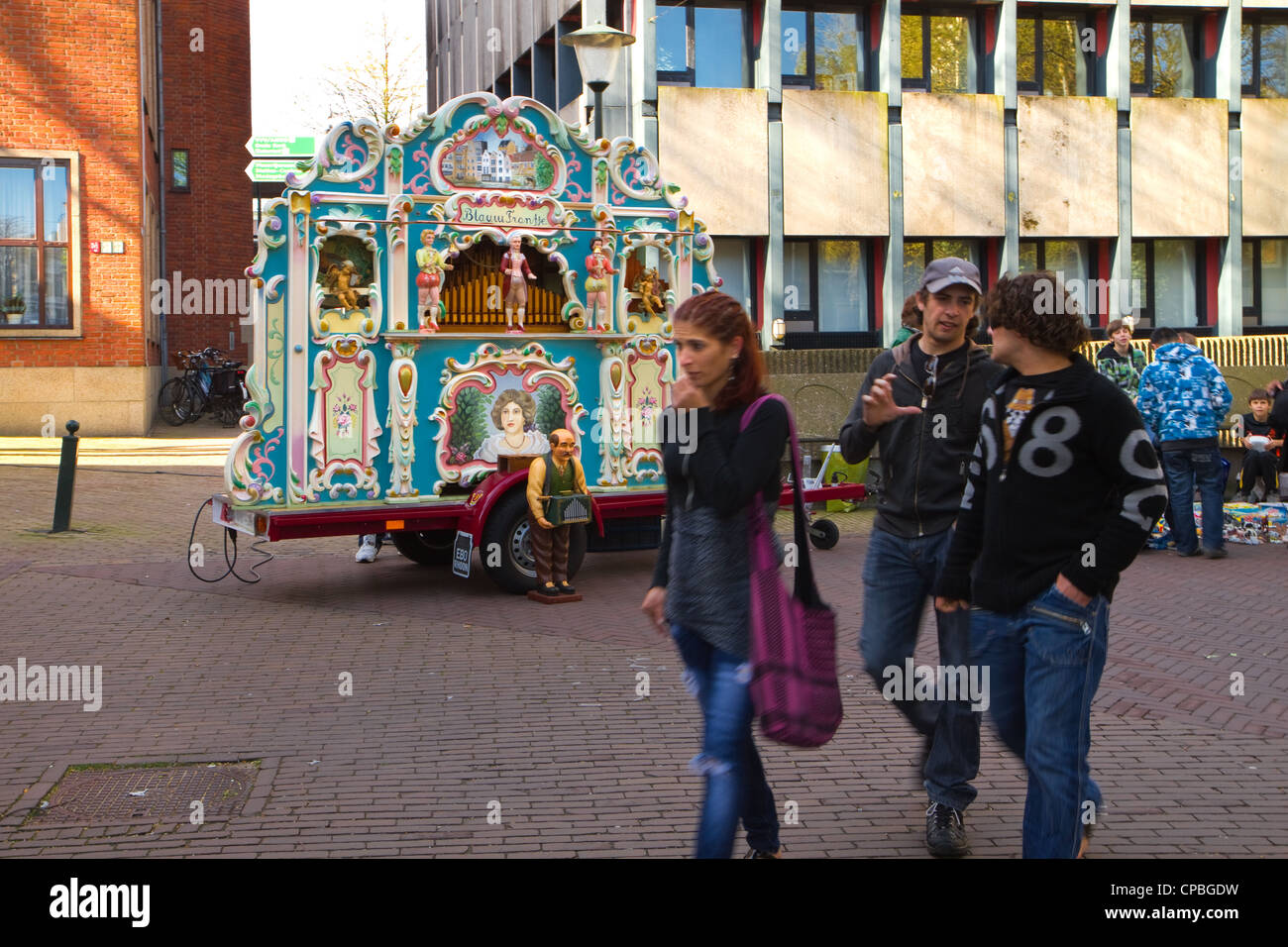 2012, 30 April - Barrel-organ playing music in the street on Queensday in Vlaardingen, the netherlands Stock Photo