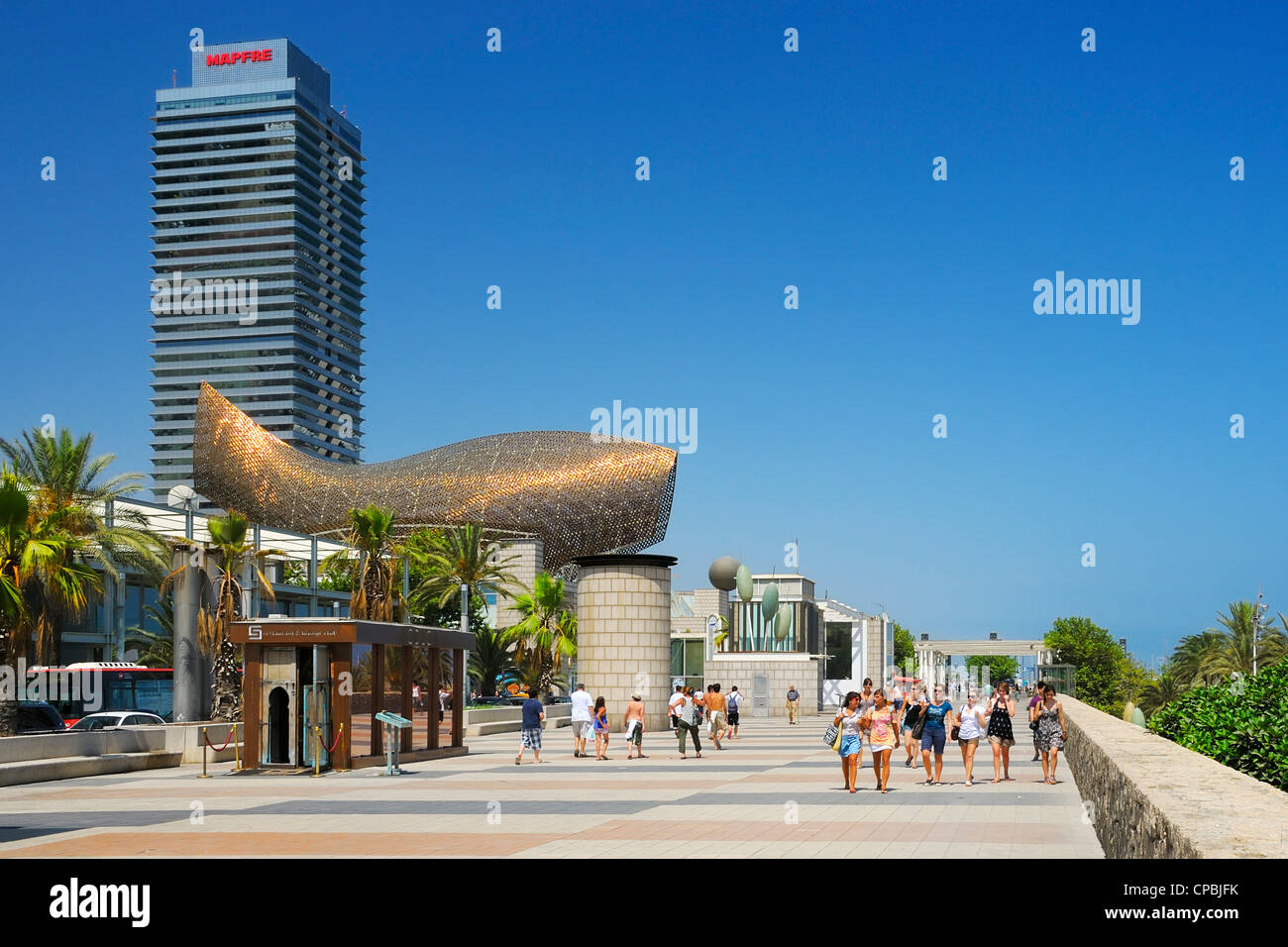 The promenade in Marina Village at the Barcelona Olympic Port in Barcelona, Spain, Europe. Stock Photo