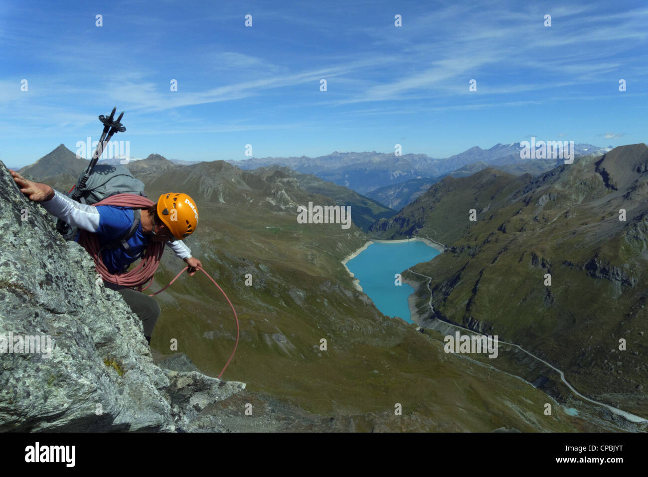 A climber descending a steep section on the Couronne de Briona in Switzerland Stock Photo
