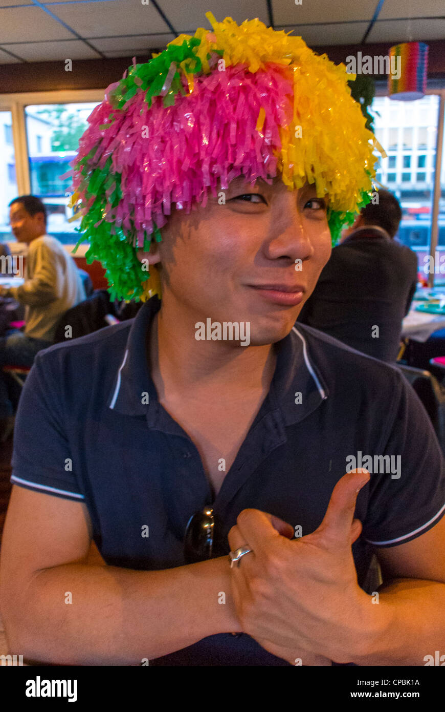 Paris, France, French Asian Gay Association Birthday Party on Boat on Seine  River, Long Yang Club Man wearing Silly Multi-color wig, portraits gay men  Stock Photo - Alamy