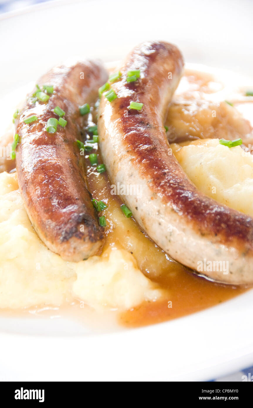 German Grobe sausage bratwurst with mashed potatos sauerkraut as photographed in Berlin Germany Stock Photo