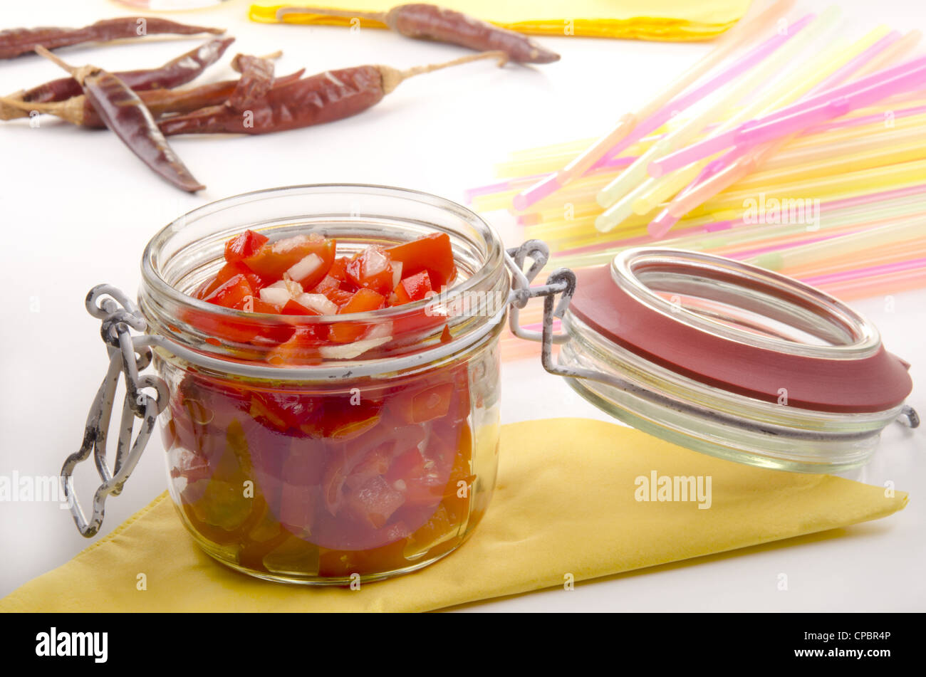 home made red bell pepper and tomato relish with onion Stock Photo