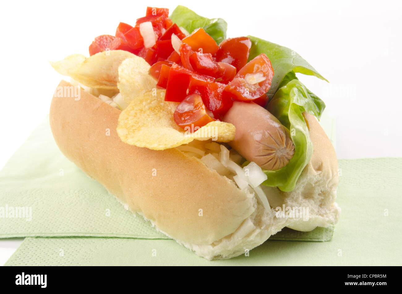 hotdog with potato chips and tomato relish Stock Photo