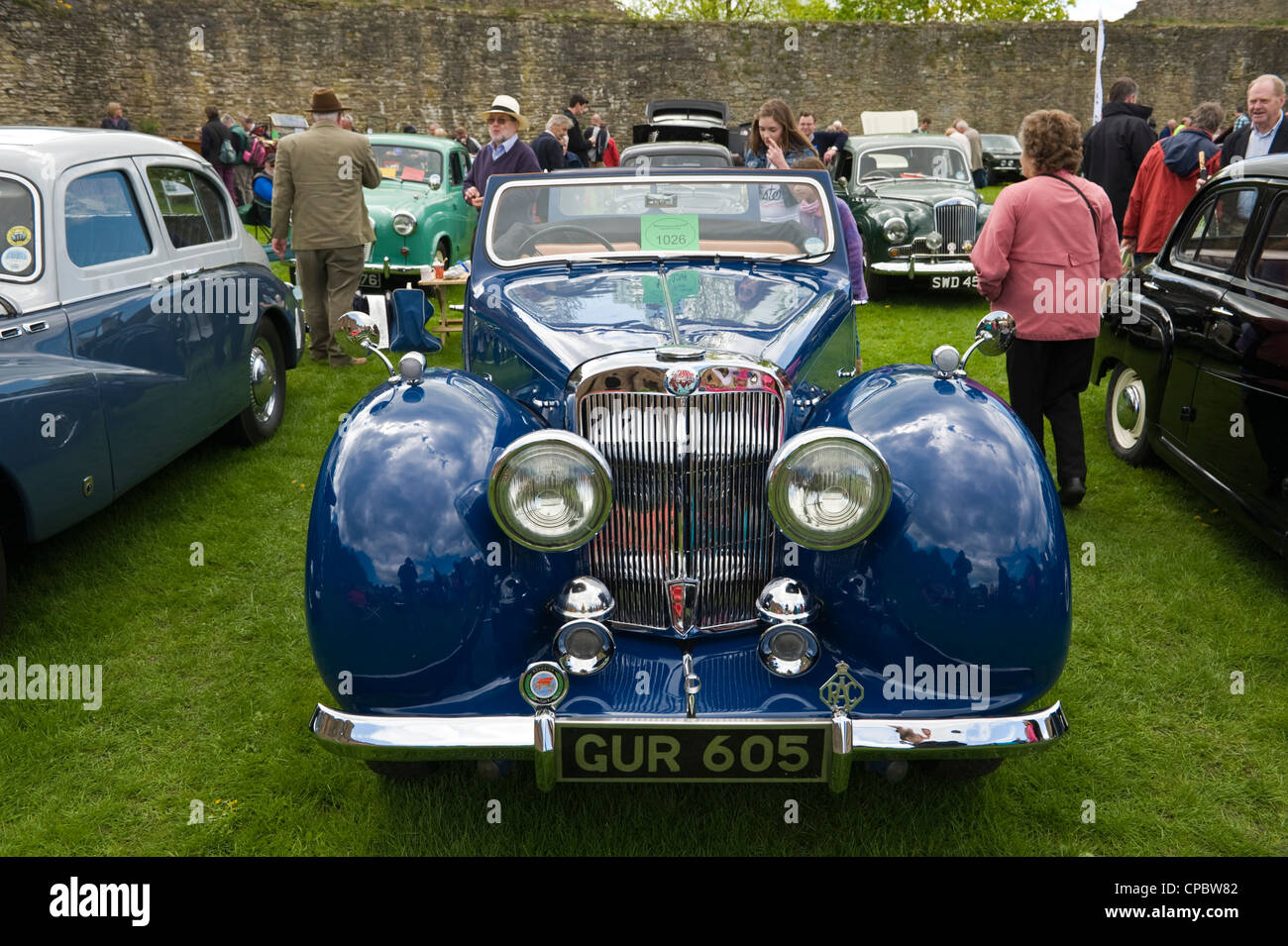 Vintage classic blue Triumph Roadster convertible sports car on display at the Marches Transport Festival exhibition of vintage and classic cars on show at Ludlow Spring Food Festival Stock Photo