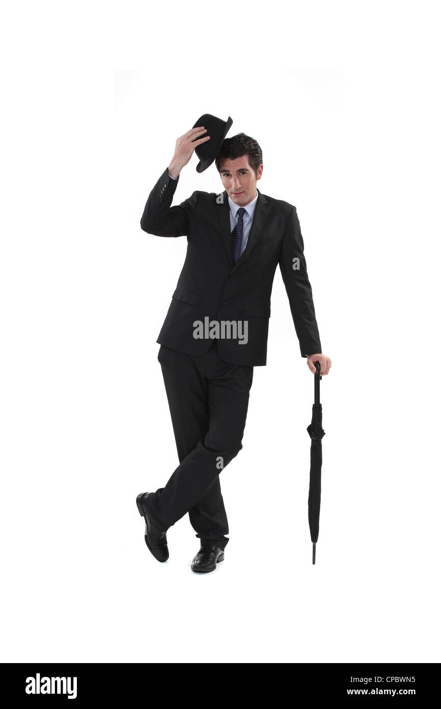 Businessman bowler hat umbrella hi-res stock photography and images - Alamy