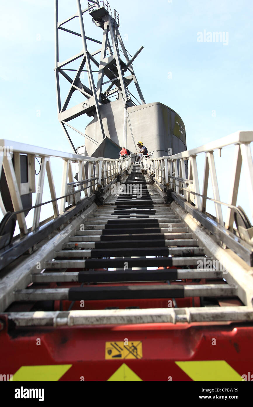 A view from the bottom of a London Fire Brigade turntable ladder. Stock Photo