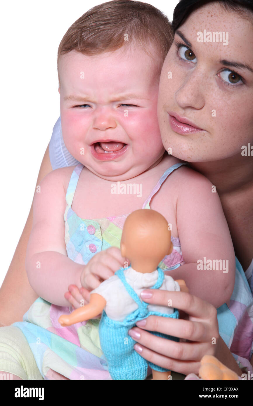 Mother with crying baby Stock Photo