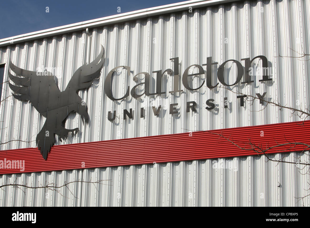 Carleton University fieldhouse and the the Ravens logo are pictured in