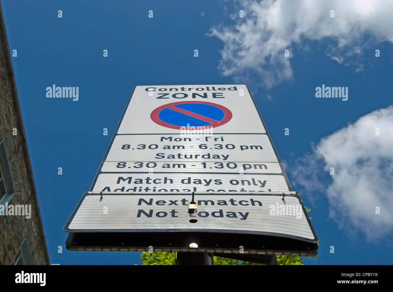 controlled zone parking sign with times and indicating additional