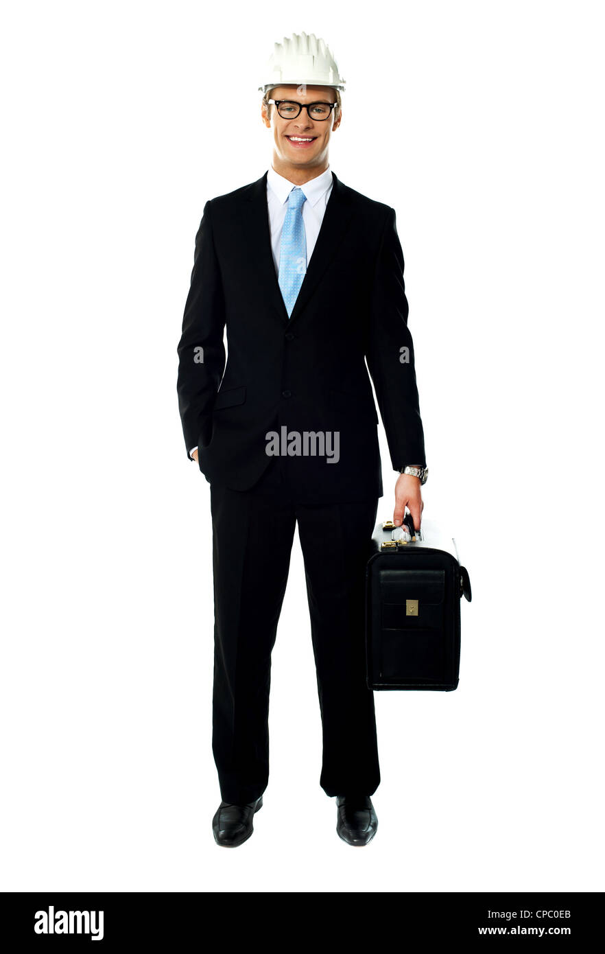 Portrait of smiling young architect carrying briefcase isolated over white Stock Photo