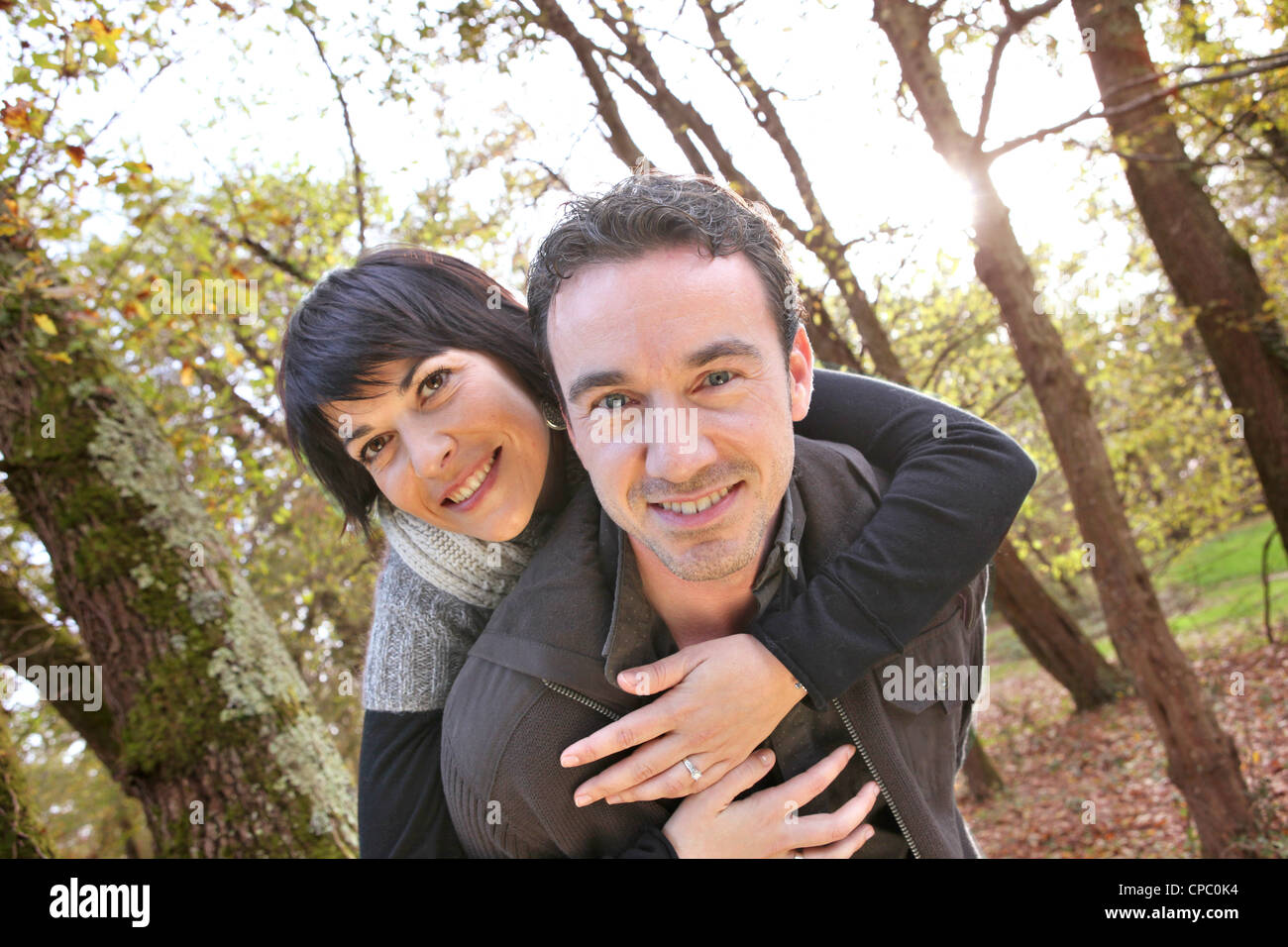 Couple in the woods Stock Photo - Alamy