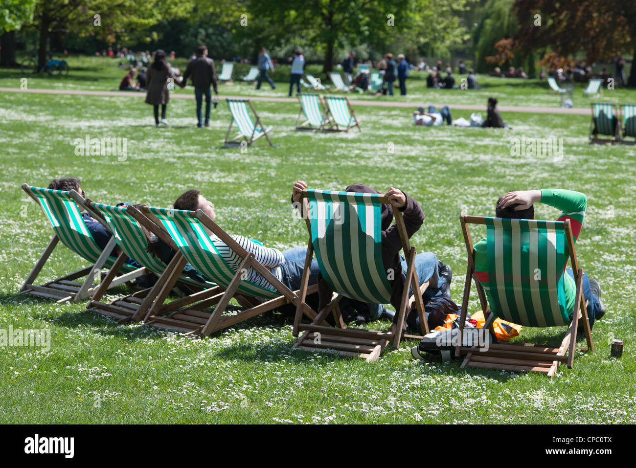 Stripped deck chairs at St James park, London. UK Stock Photo - Alamy