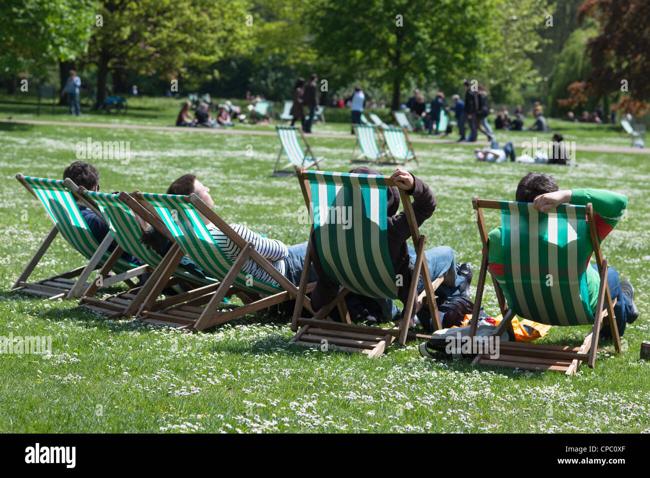 Stripped deck chairs at St James park, London. UK Stock Photo - Alamy