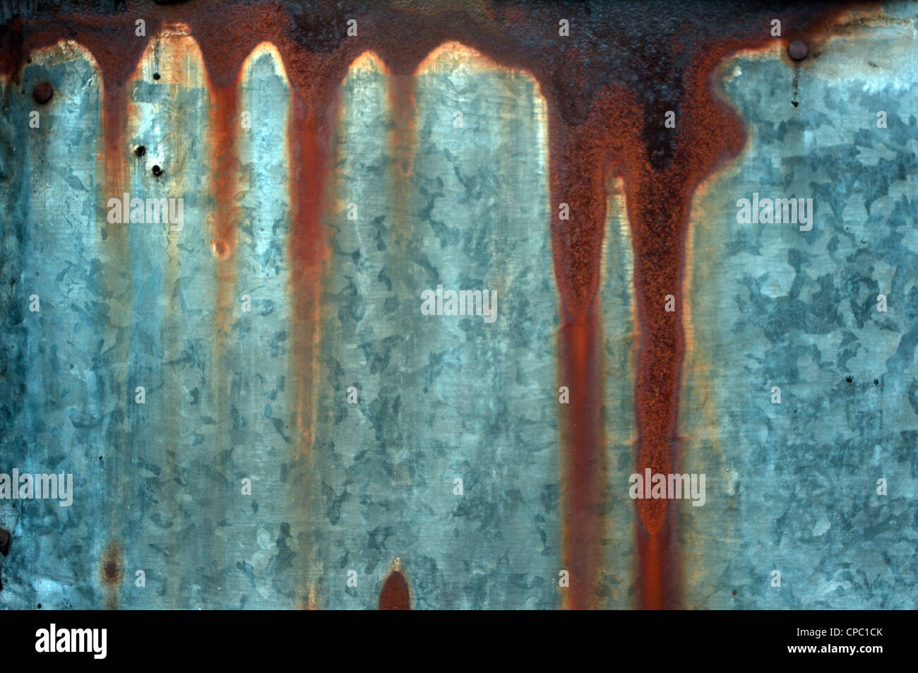 Rust stains on the blue sheet. Stock Photo