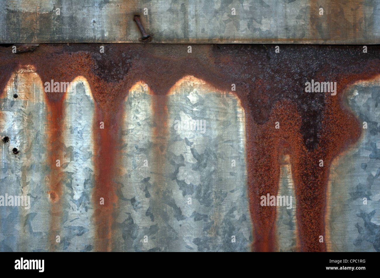 Streaks of rust on a metal baking sheet. Stock Photo