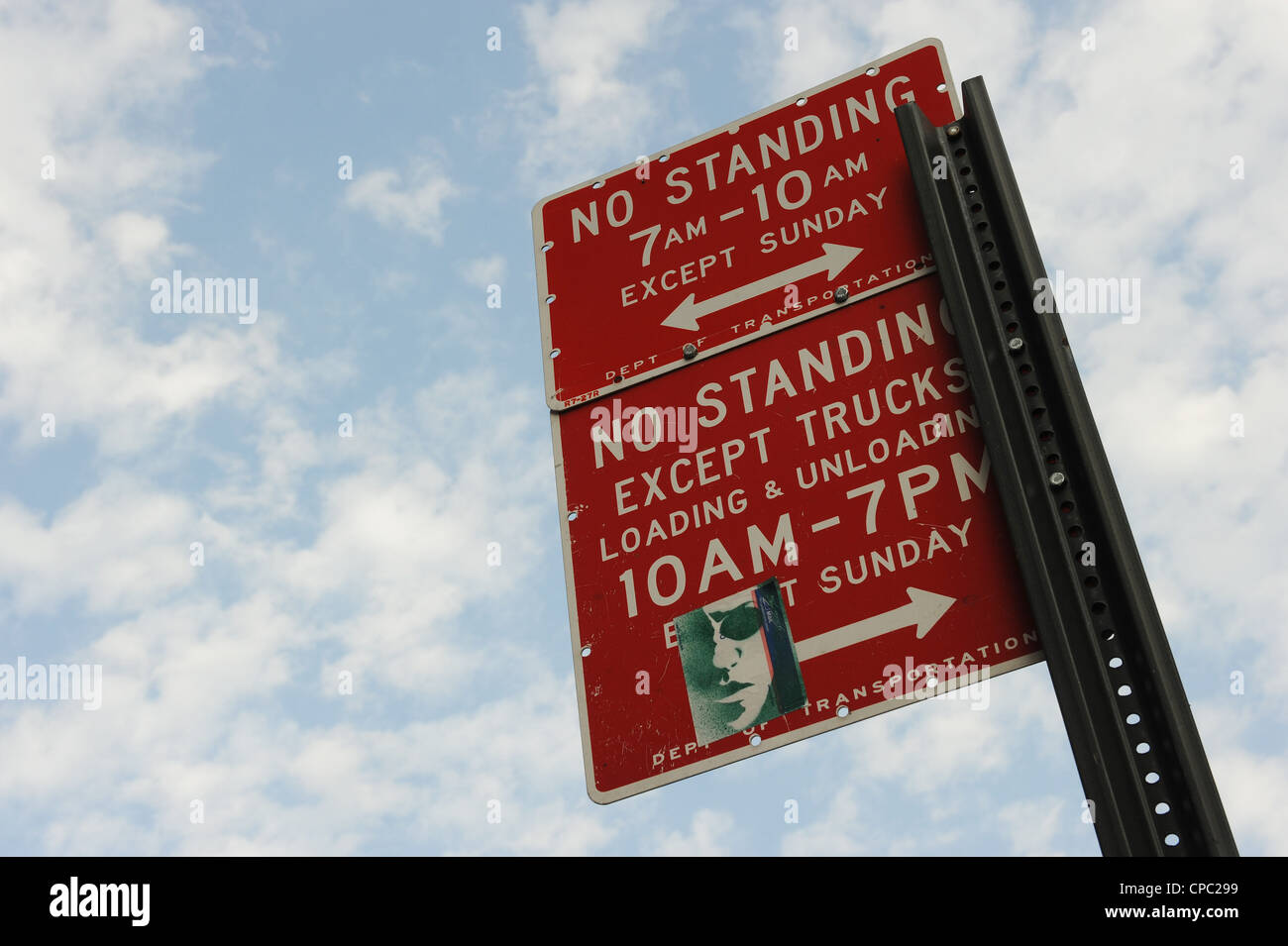 Traffic Sign With Sticker High Resolution Stock Photography and Images