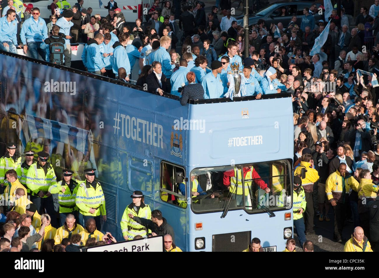 Manchester City FC Premier League Trophy Parade.2012. 100,000 blues fans turn out to celebrate victory for their club. Stock Photo