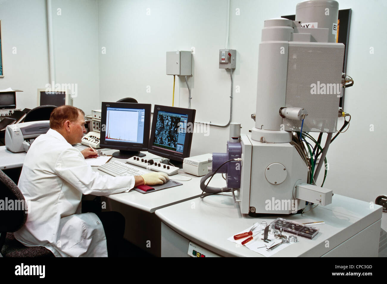 Researcher, Phillips FEI XL30 SFEG Scanning Electron Microscope. Stock Photo
