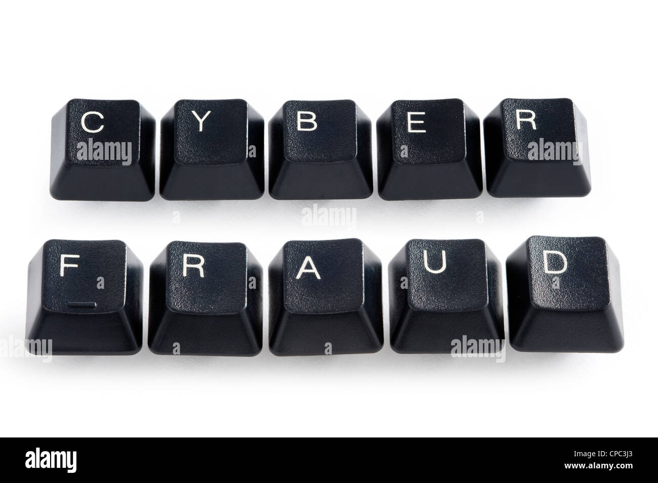 computer keys spelling the words cyber fraud Stock Photo