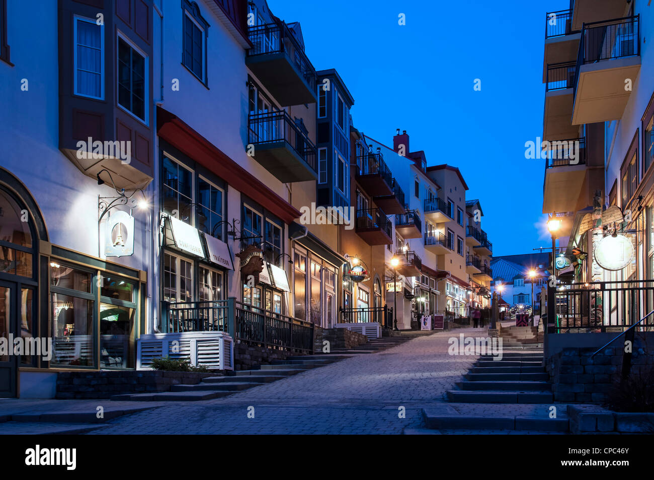 Rue des Remparts at dusk, Mont Tremblant base village, Quebec, Canada ...