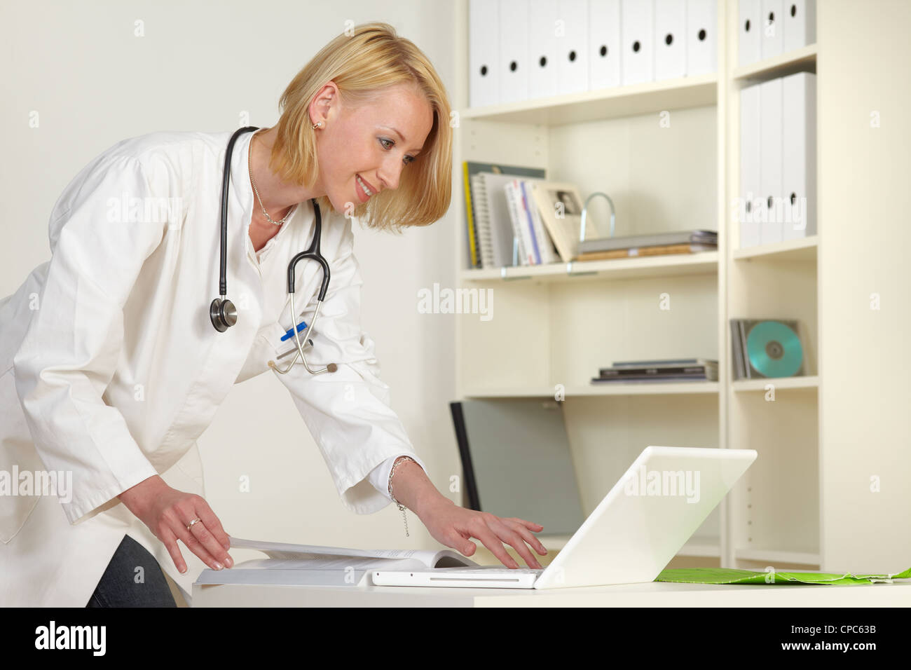 Attractive woman doctor hi-res stock photography and images - Alamy