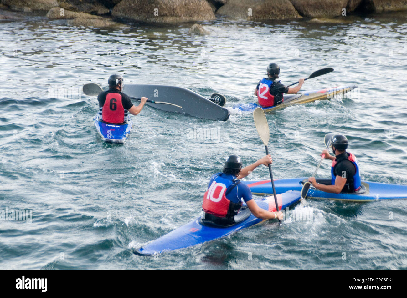 canoe canoes canoing water polo football net barrel roll rolling