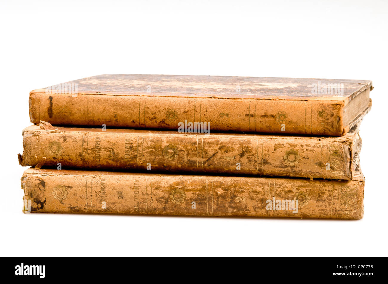 three old books stacked Stock Photo