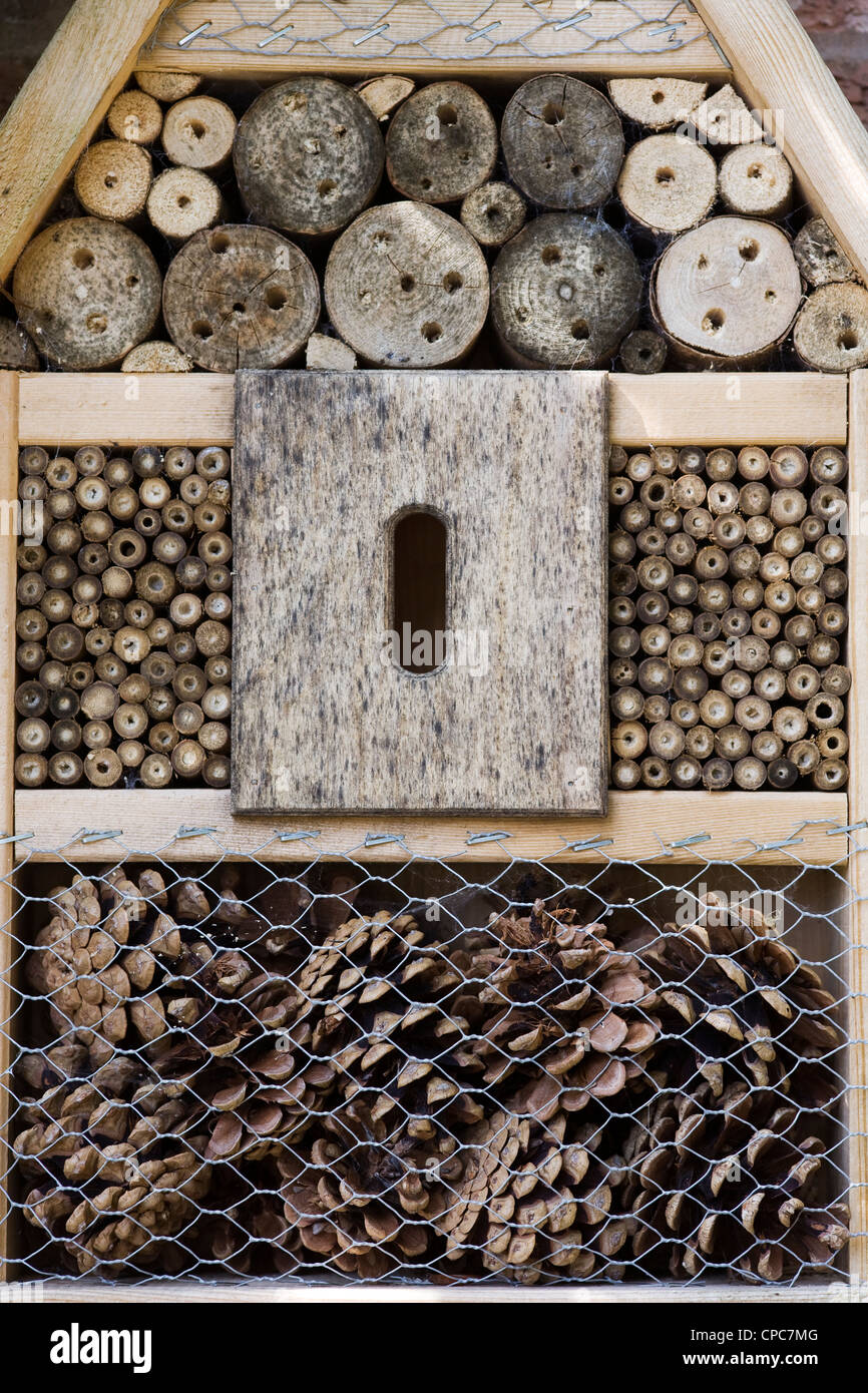 A bug house to encourage beneficial insects into the garden. Stock Photo