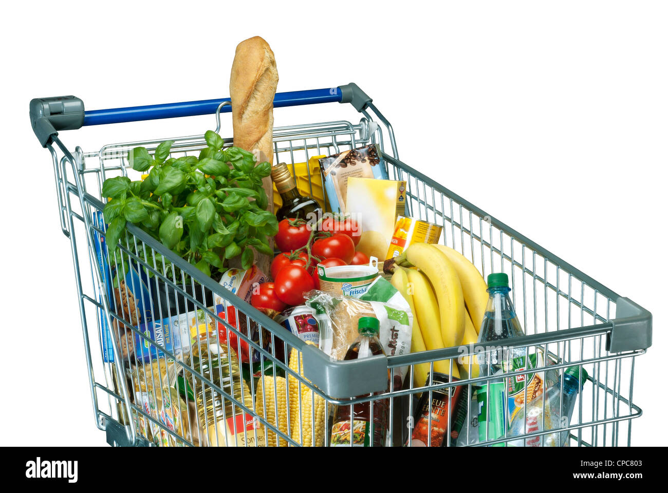 Shopping cart with food, isolated on a white background. Stock Photo