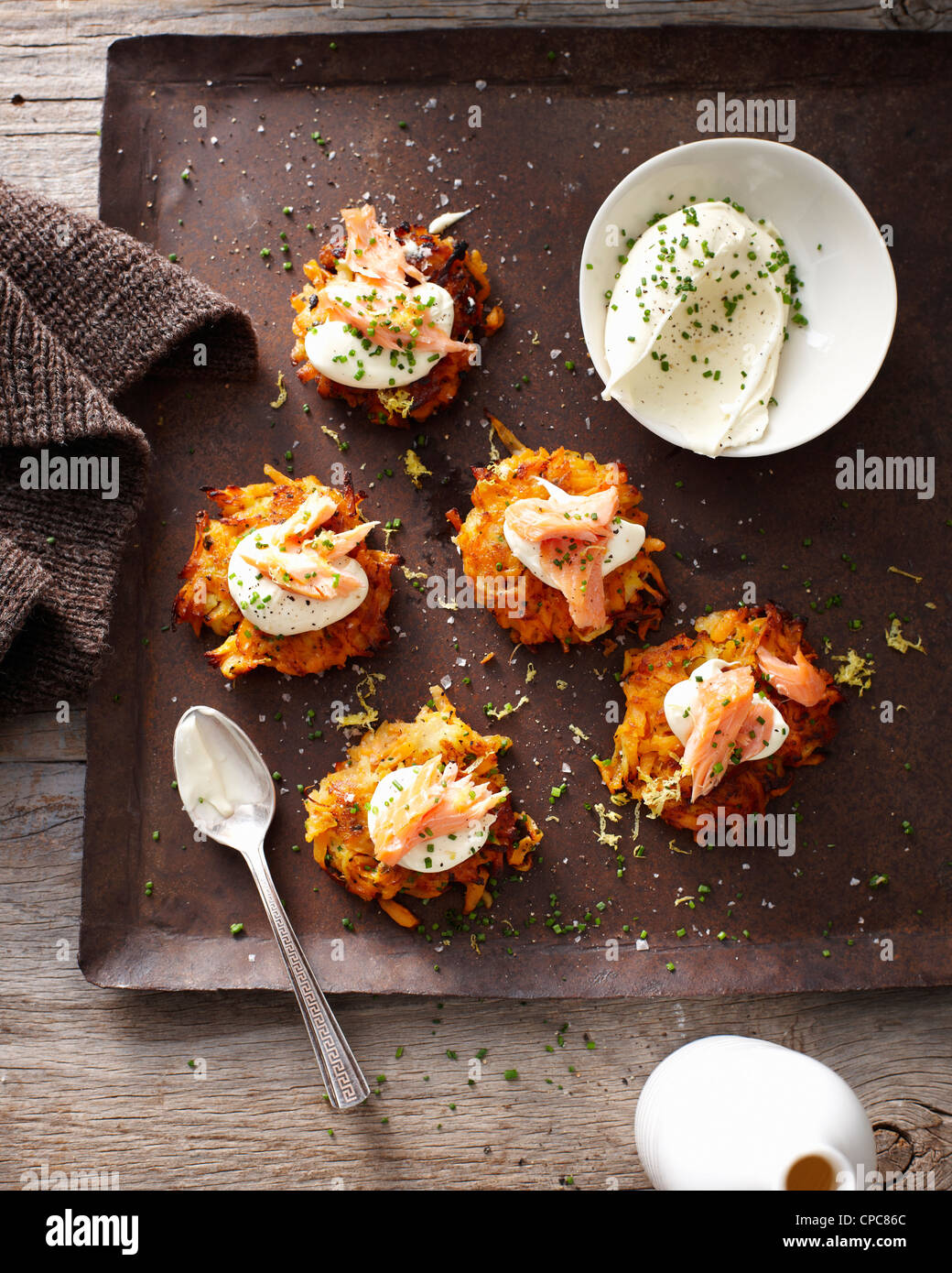 Tray of autumn rosti and sour cream Stock Photo