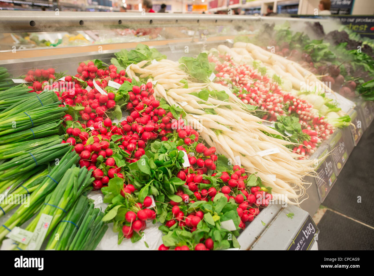Supermarket fresh vegetable counter. UK Stock Photo Alamy