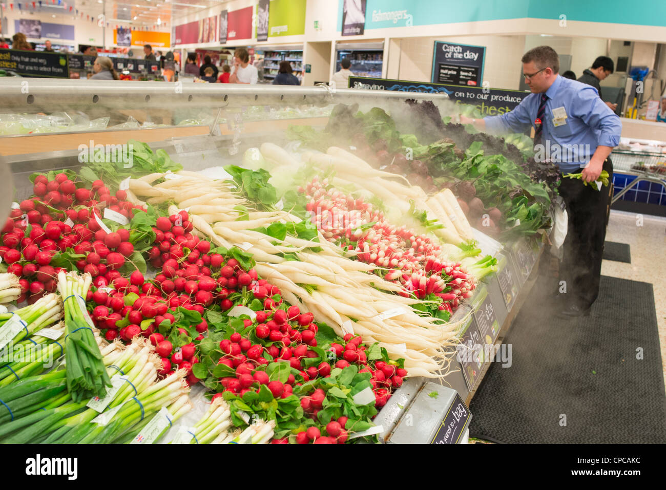 Supermarket fresh vegetable counter. UK. Stock Photo