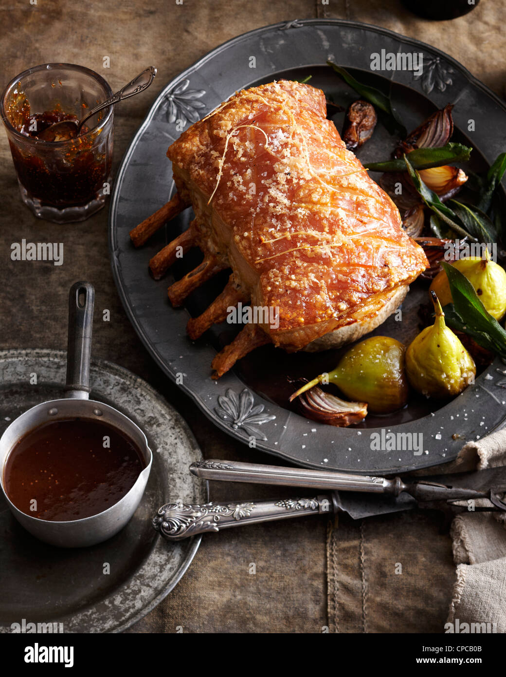Roast pork rack with fig jam Stock Photo