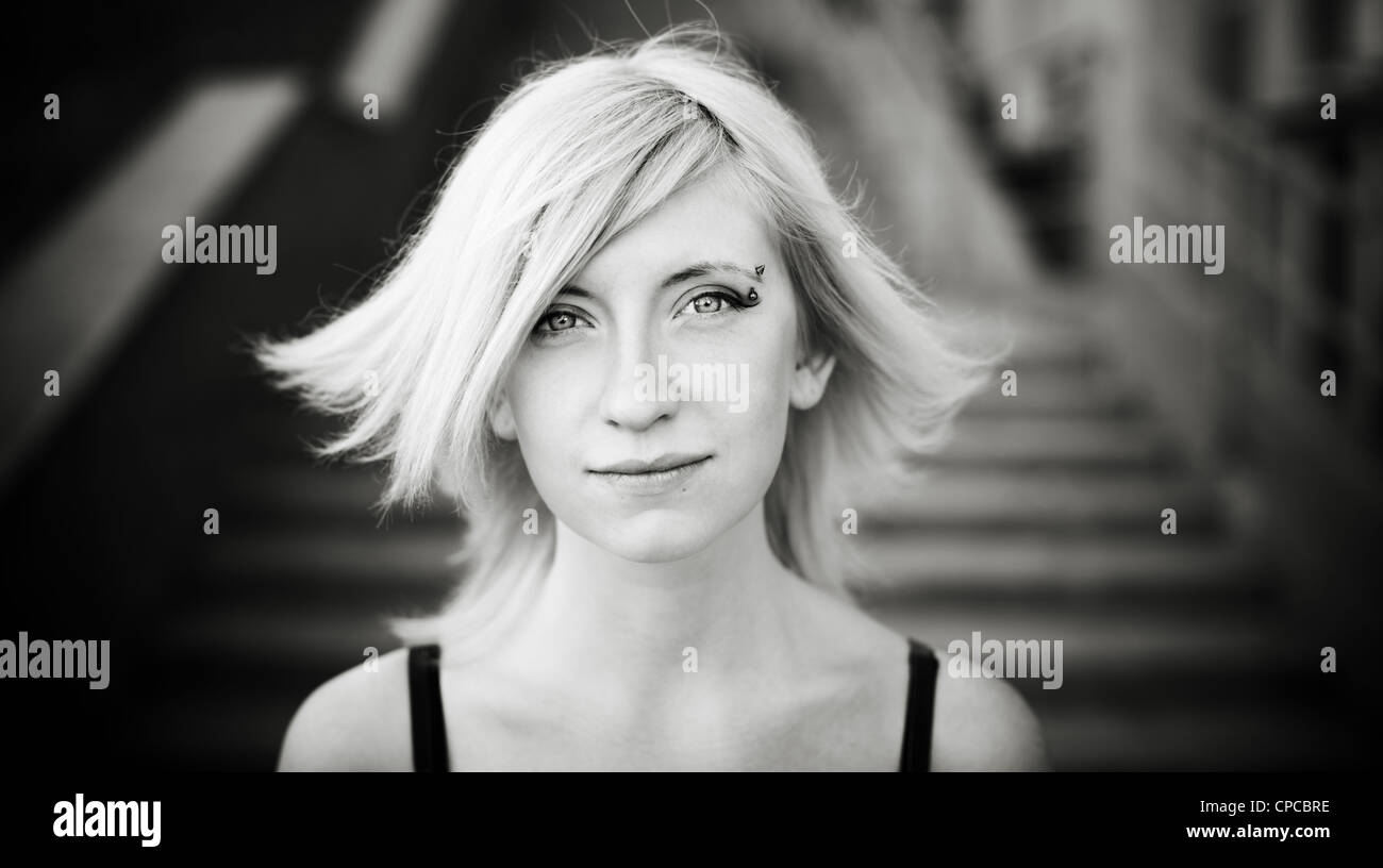 black and white portrait with lite wind and soft natural light,selective focus on eyes Stock Photo
