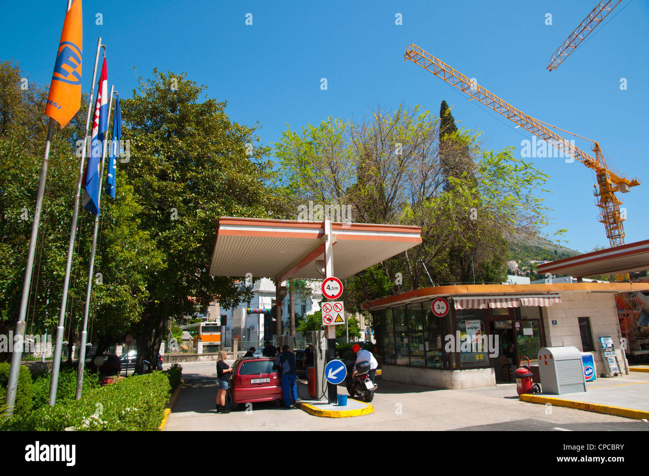 Petrol station and building cranes Gruz district Dubrovnik city Dalmatia Croatia Europe Stock Photo