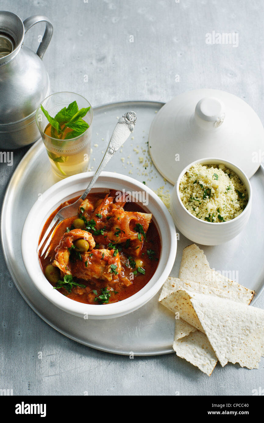 Bowl of fish tagine with couscous Stock Photo Alamy
