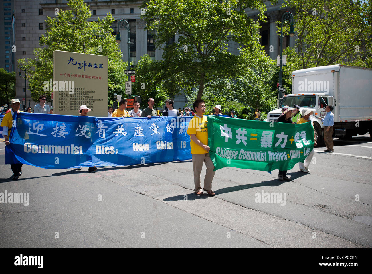 Carrying Banners And Signs Members Of Falun Dafa From Around The
