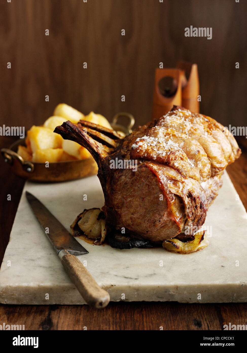 Rack of roast beef on marble board Stock Photo - Alamy