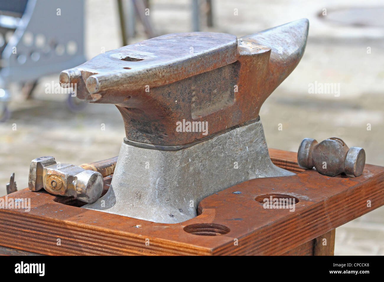 An heavy anvil with two hammers Stock Photo Alamy