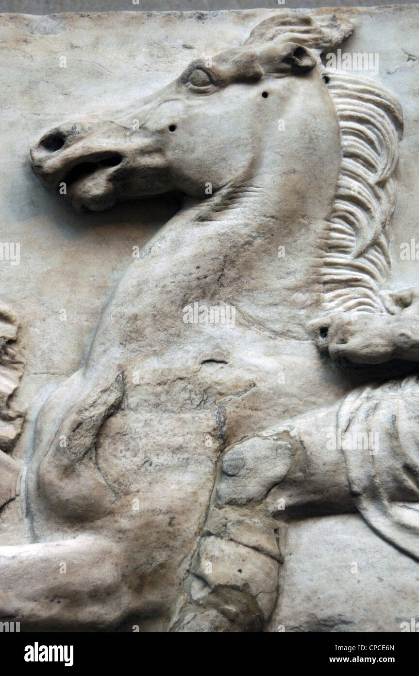 Greek Art. Parthenon. Marshal looking towards the horseman who overtakes him on the left. Detail. Horse. West Frieze I. Stock Photo