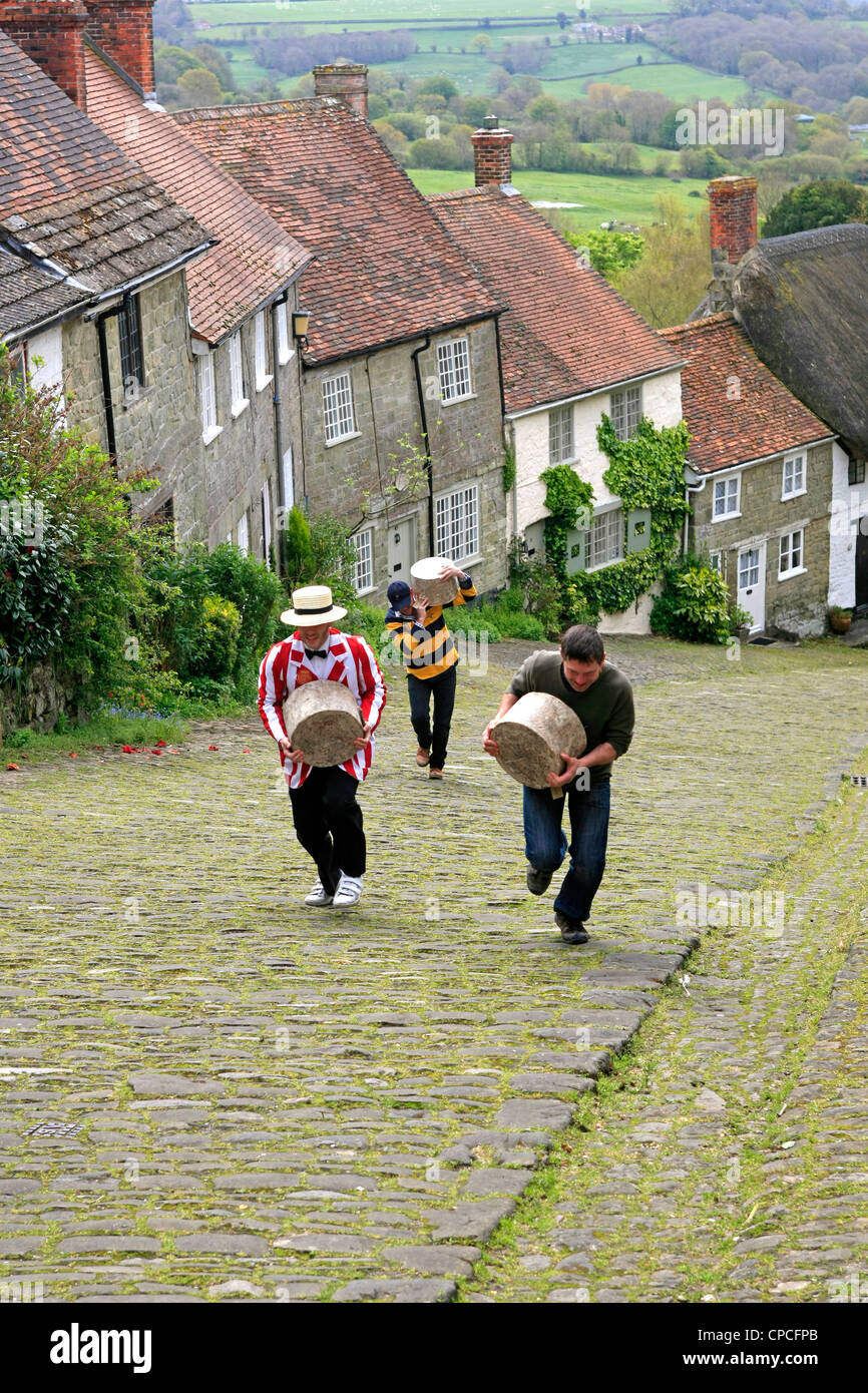 Dorset Cheese Carrying contest up Gold Hill in Shaftsbury Dorset Stock