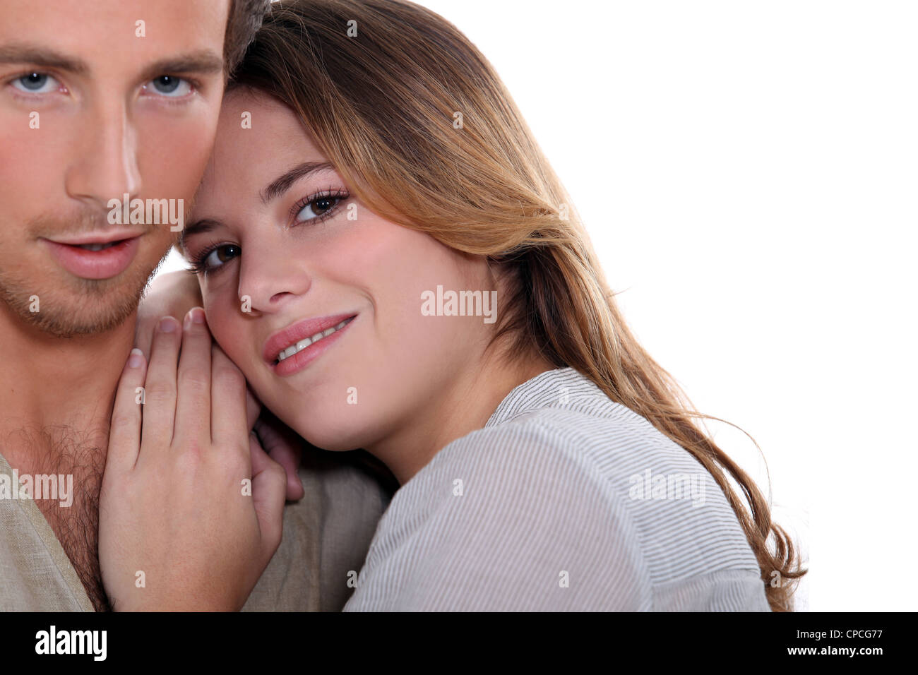 a young woman leaning on boyfriend's shoulder Stock Photo