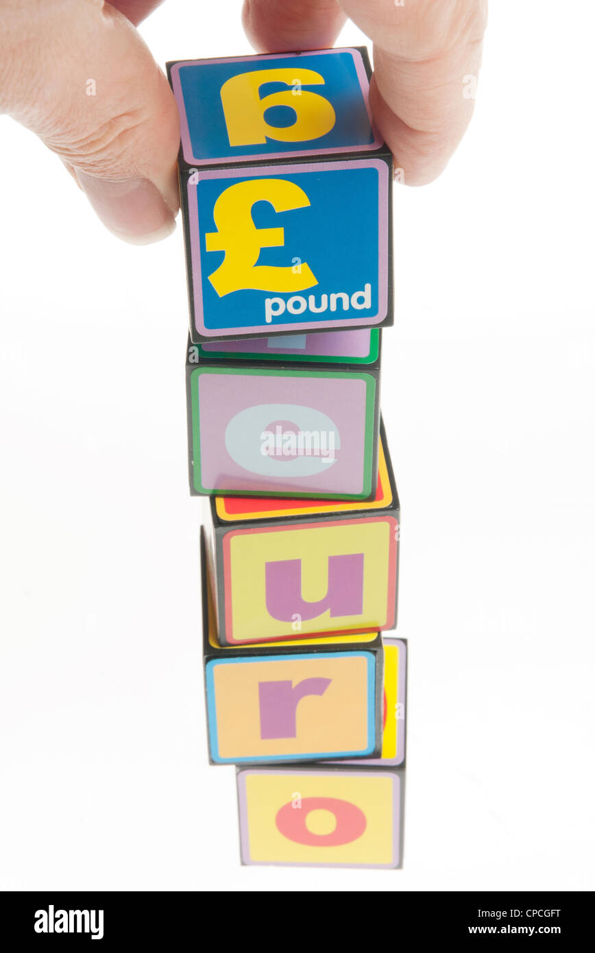 the pound and the euro building block concept Stock Photo Alamy