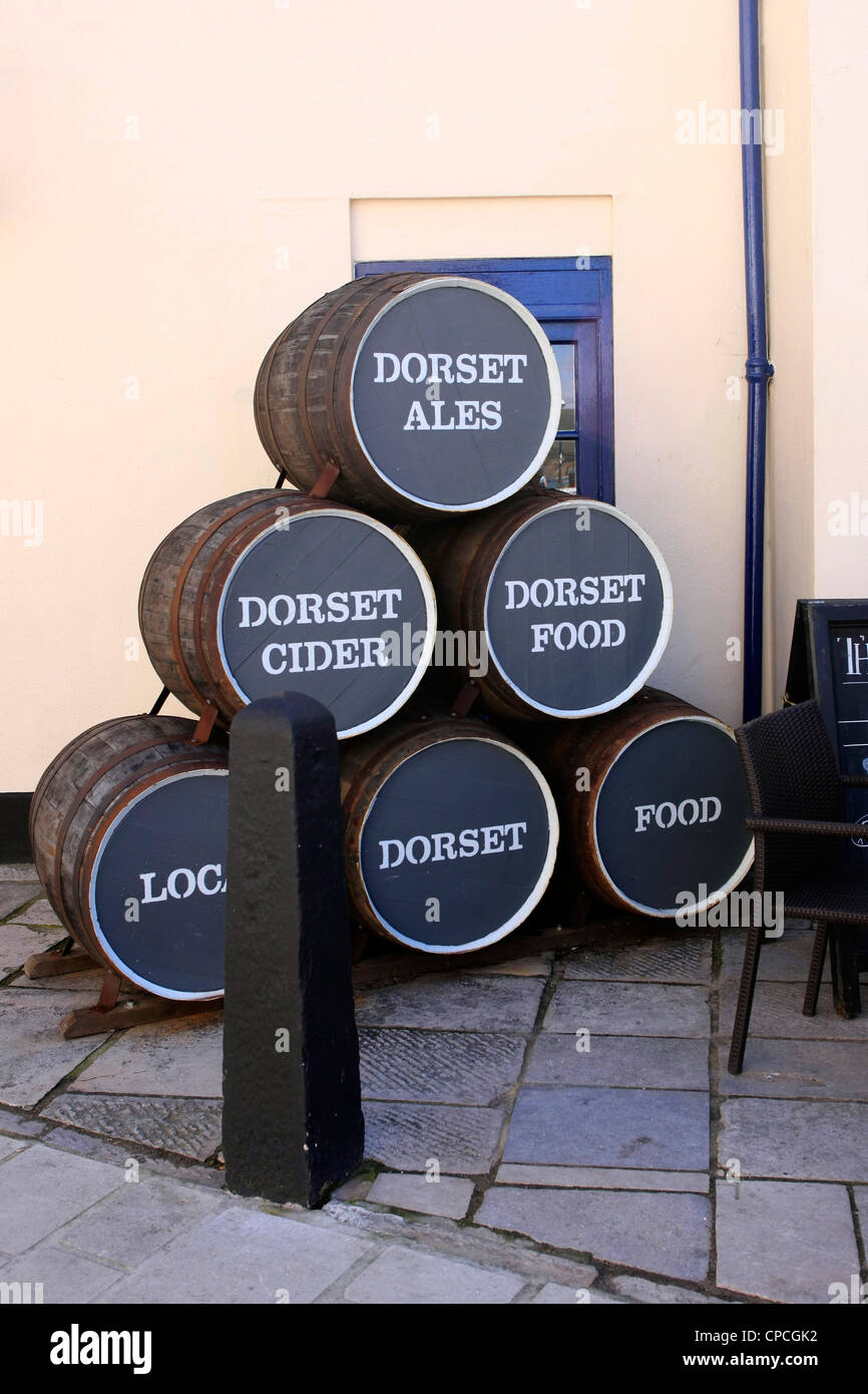 Old Beer Barrels used for advertising Dorset products Stock Photo Alamy